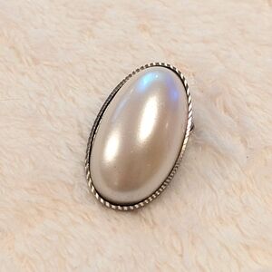 Vintage Creamy White Large Oval Faux Pearl Brooche w/ Notched Silvertone Boarder